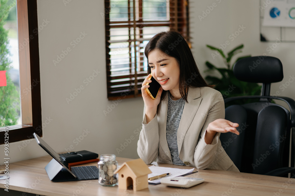 Real estate broker agent presenting and consult to customer to decision making sign insurance form agreement, home model, concerning mortgage loan offer in office. Real estate broker agent presenting and consult to customer to decision making sign insurance form agreement, home model, concerning mortgage loan offer in office.