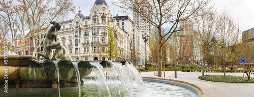 View of the Fountain of the Birth of Water on the Square of Spain in Madrid.