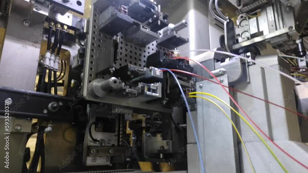 A robot for the manufacture of automotive electrical wiring. Mechanisms are robotic. A robot for the manufacture of automotive electrical wiring. Mechanisms are robotic.