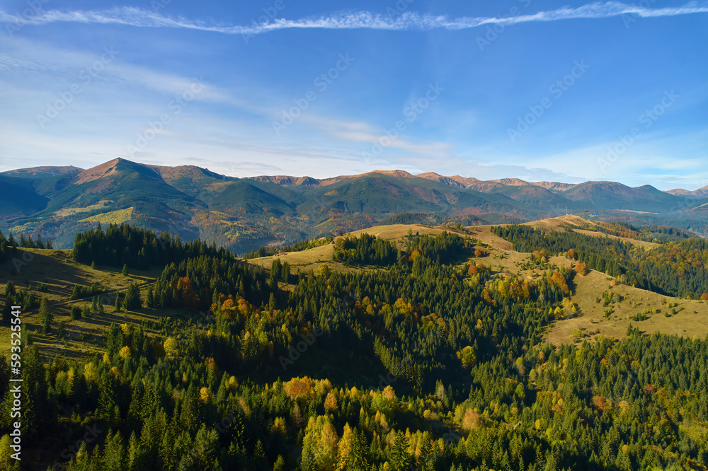 Sunset over the mountains in the Carpathians. Aerial drone view.