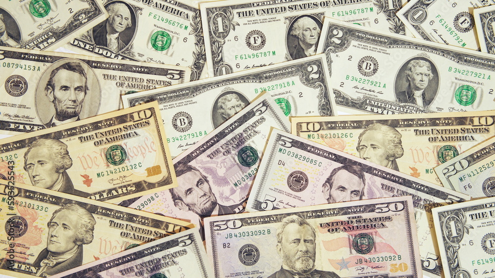 World currency banknote, economic crisis, inflation.U.S. banknotes of various dollar denominations. World currency banknote, economic crisis, inflation.U.S. banknotes of various dollar denominations.