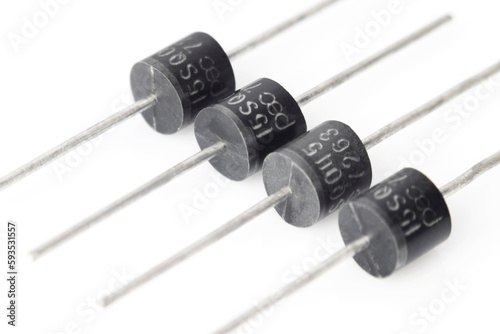 semiconductor silicon rectifier diodes, bipolar electronic components, zener diode or schottky diode, electrical engineering, isolated on white background photo