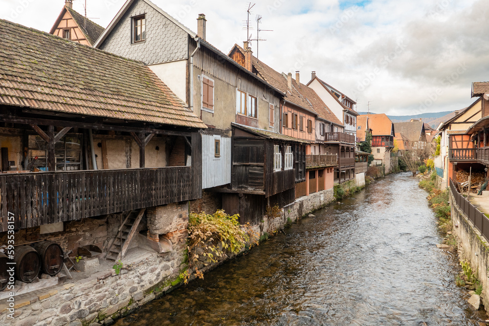 Kaysersberg; Alsace, France - December 7, 2022: Traditional houses by the river
