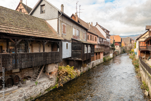 Kaysersberg; Alsace, France - December 7, 2022: Traditional houses by the river