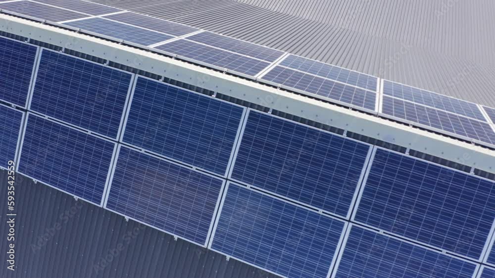 Photovoltaic system installed on rooftop, renewable energy production. Aerial Photovoltaic system installed on rooftop, renewable energy production. Aerial