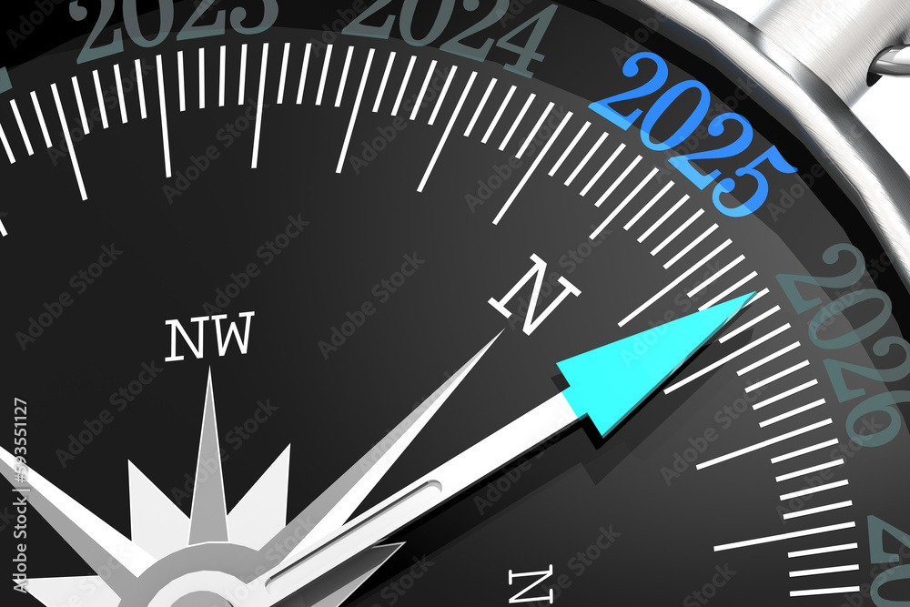 Metal compass with year 2025 on black surface Metal compass with year 2025 on black surface
