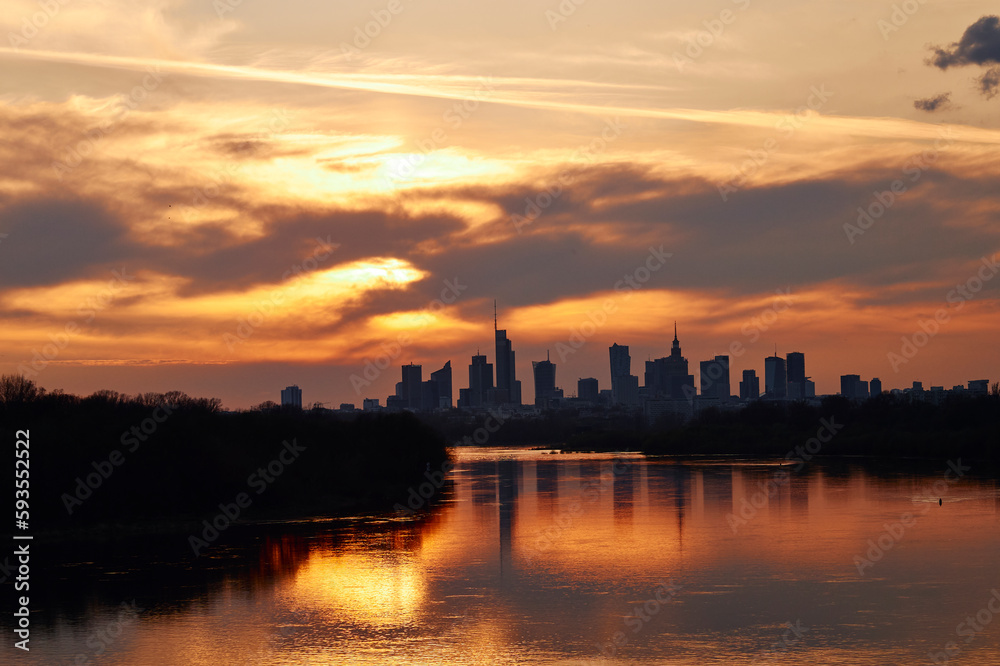 Sunset over the center of Warsaw in spring, view from the Vistula River