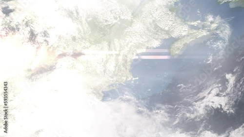 Earth zoom in from outer space to city. Zooming on Fitchburg, Massachusetts, USA. The animation continues by zoom out through clouds and atmosphere into space. Images from NASA photo