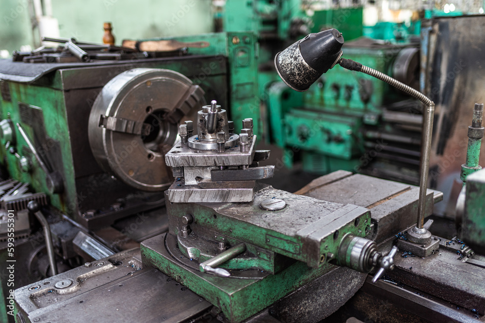 Old equipment, machines, tools in a rustic style in an abandoned mechanical factory