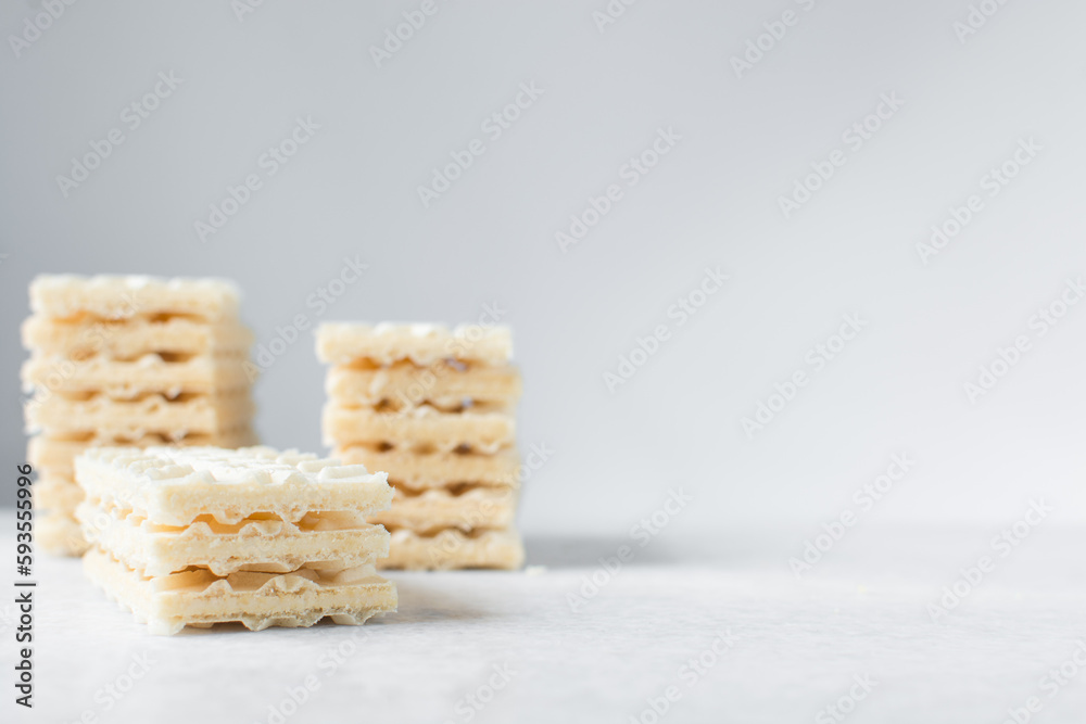 Vanilla wafers on a marble plate, wafer cookies filled with vanilla cream Vanilla wafers on a marble plate, wafer cookies filled with vanilla cream