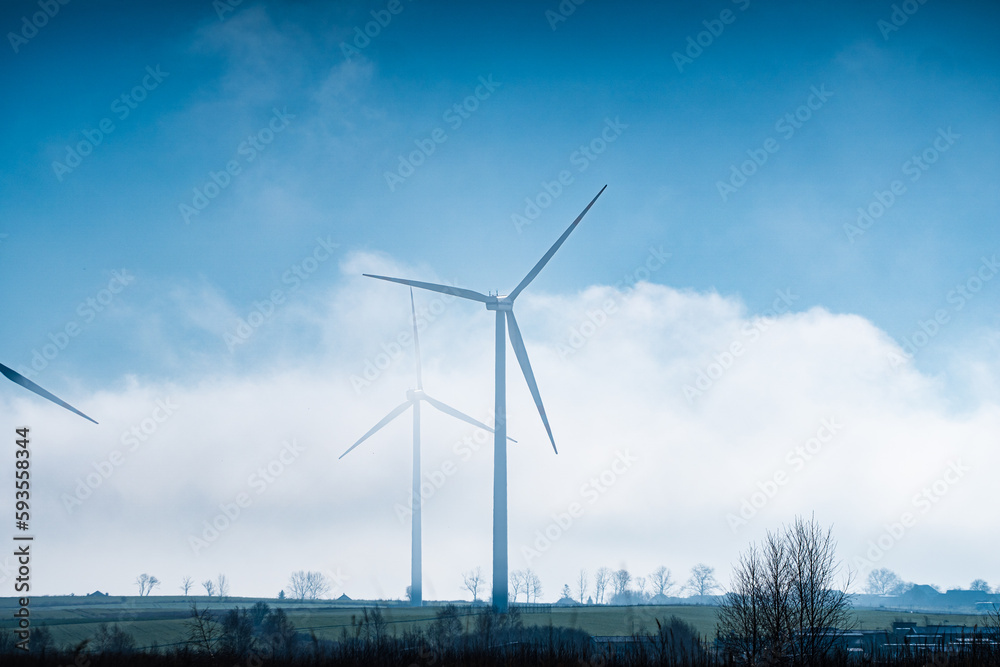 drone view of the wind farm in the field. Electricity production with windmills. Renewable energy sources drone view of the wind farm in the field. Electricity production with windmills. Renewable energy sources
