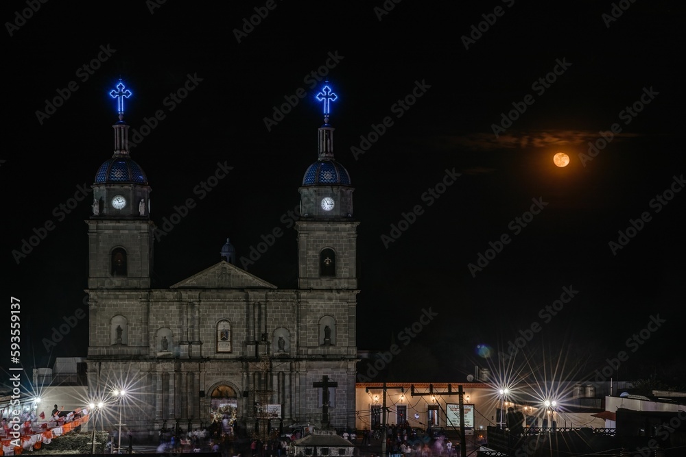 Fototapeta premium Beautiful shot of fireworks in front of church during city's holidays of Tuxpan, Jalisco, Mexico