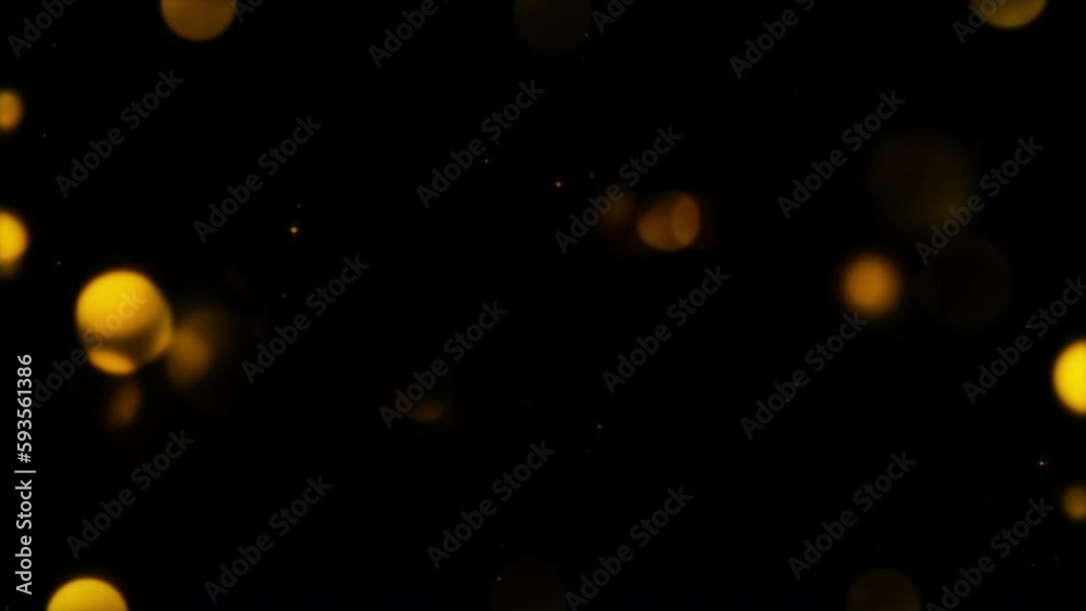 Loop glow gold orange bokeh particles animation abstract on black abstract background. Abstract motion background shining particles magic golden bokeh light waves 