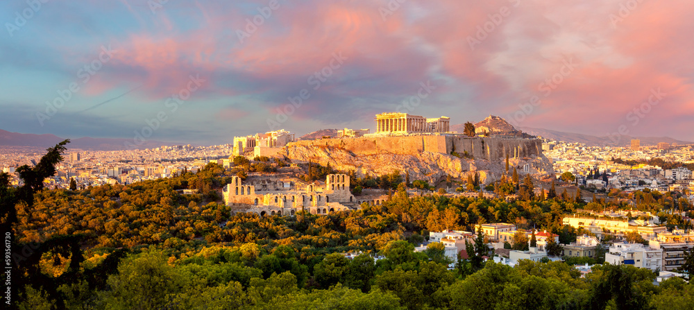 The Acropolis of Athens, Greece, with the Parthenon Temple with colorful clouds at  sunset time. Athens, Greece, Europe