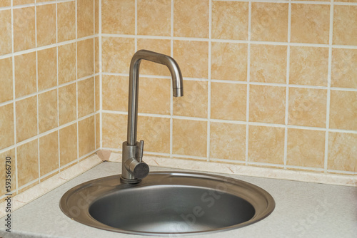 A sink with a faucet in the kitchen.