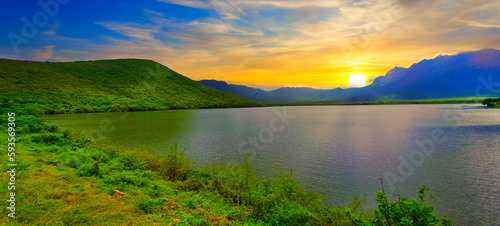 Nature's Canvas: Sunset on the Mountain Lake,Tranquil Twilight on the Mountain Lake