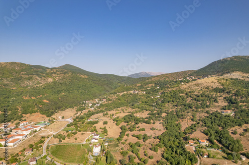 Meandering serpentine road in the mountain. Aerial view. Copter, drone view