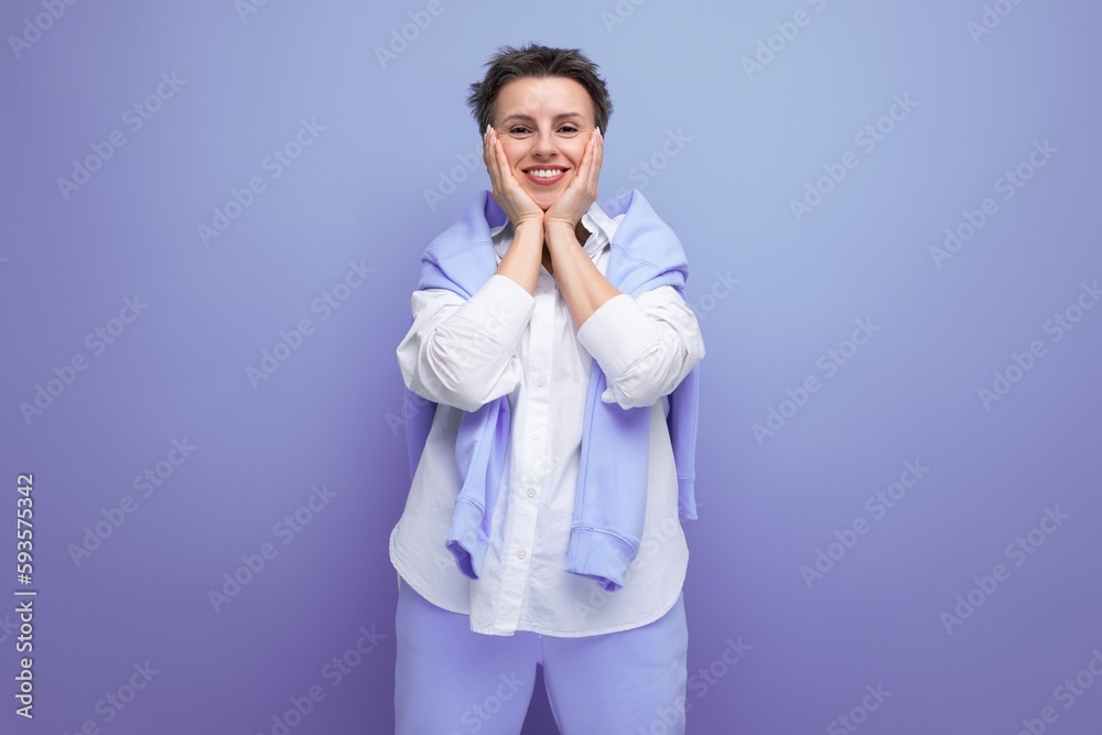 positive young woman with short haircut in stylish casual look positive young woman with short haircut in stylish casual look