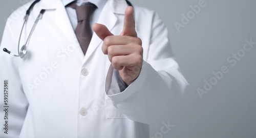 man in white lab coat showing thumbs up, closeup shot