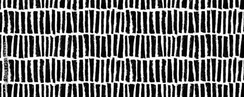 Abstract striped grunge seamless pattern. Vertical short strokes and brush lines. Rough grunge stamps wallpaper. Sloppy strokes in a row. Vector texture banner. Geometric pattern with thick lines.