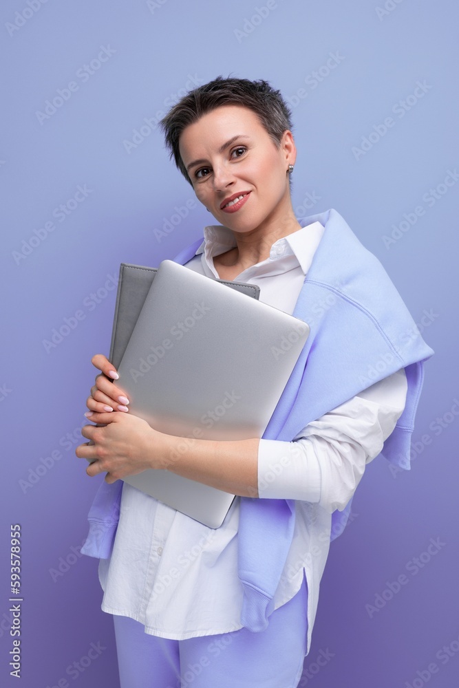 confident stylish freelancer woman with laptop mockup on studio background confident stylish freelancer woman with laptop mockup on studio background