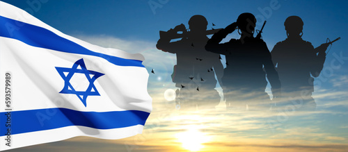 Silhouette of soldiers with Israel flag against the sunrise. Concept - Armed Forces of Israel. EPS10 vector