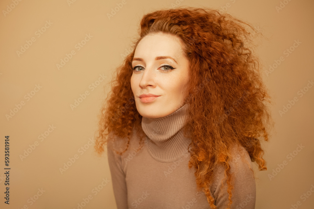 beautiful red-haired curly girl in a lilac turtleneck beautiful red-haired curly girl in a lilac turtleneck