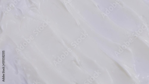 Wallpaper Mural Smears of white cosmetic product, cream, lotion moving,rotation, top view, beauty background.4K Torontodigital.ca