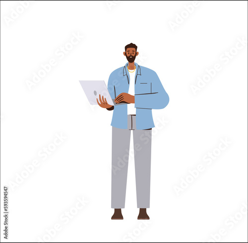 Young man standing and working on laptop computer enjoy freelance job and creative occupation