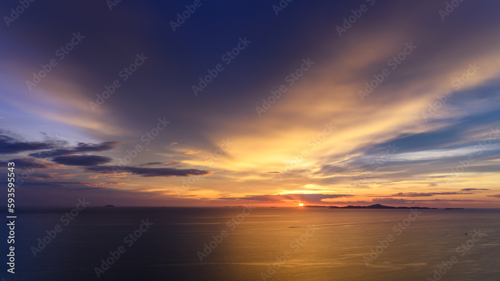Dreamy sunset on tropical sea in Pattaya, Thailand. beautiful landscape of seascape with water reflection from sunlight. background for traveling and vacation.