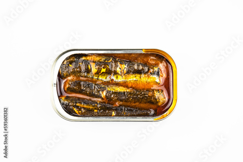 Canned fish in a metal can is isolated on a white background.