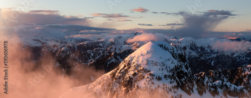Coastal Canadian Mountain Landscape covered in Snow. Aerial View from Airplane. Near Vancouver  British Columbia  Canada. Nature Background. Panorama