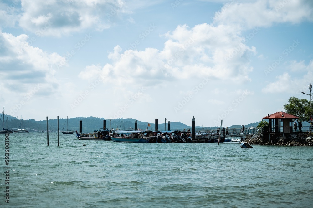 Boats in the sea in Langkawi island, Malaysia. Boats in the sea in Langkawi island, Malaysia.