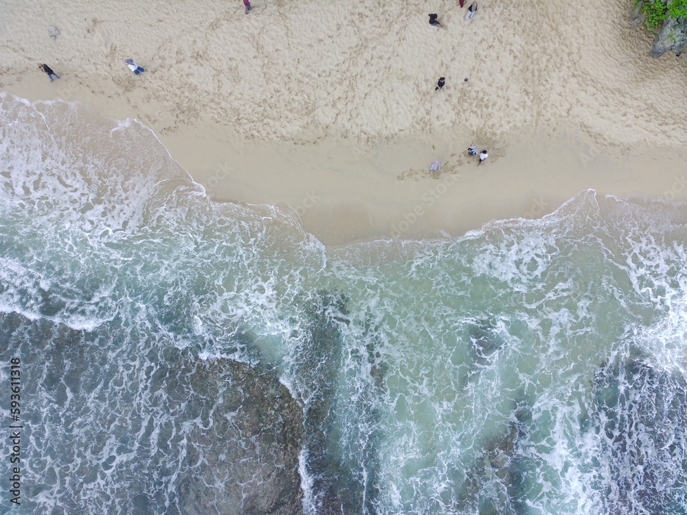 aerial top down view of beautiful sand beach and coral reefs aerial top down view of beautiful sand beach and coral reefs