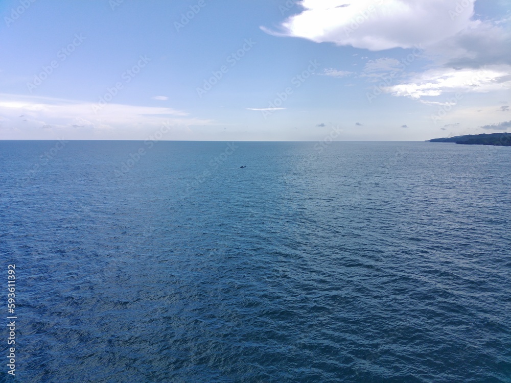 Aerial view of ships in the clear blue sea Aerial view of ships in the clear blue sea