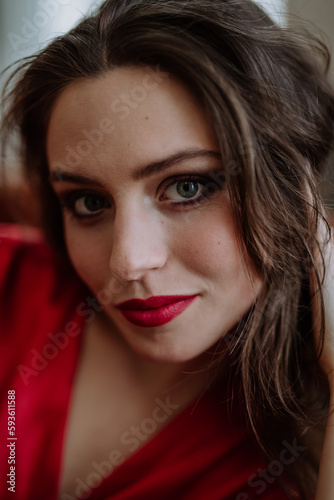 Portrait of young woman with evening make-up.