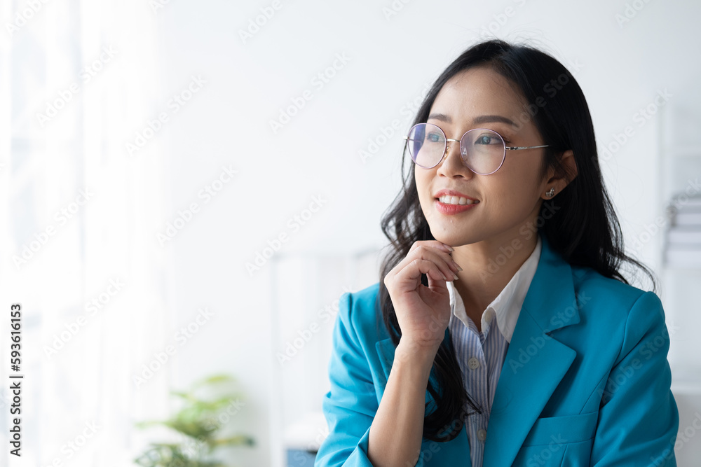 Portrait of young beautiful businesswoman working in her office room. Portrait of young beautiful businesswoman working in her office room.