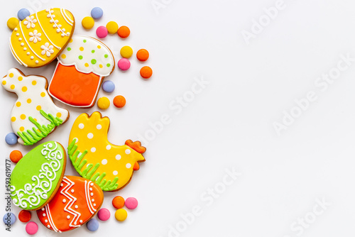 Easter baking background with cookies eggs and bunny, top view
