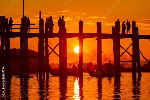 Mandalay Myanmar  November 16  2016  Unidentified people crossing famous U Bein bridge. The place is one of most visited sights in Burma