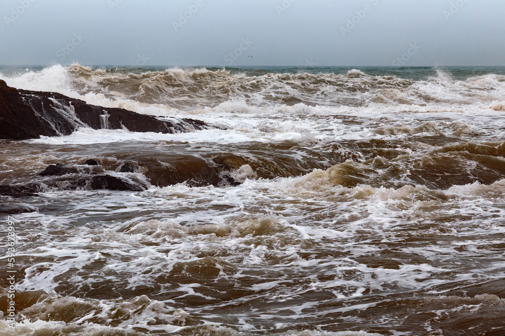 Fototapeta premium View of the volcanic shore of the stormy Atlantic Ocean in the area of Essaouira in Morocco.