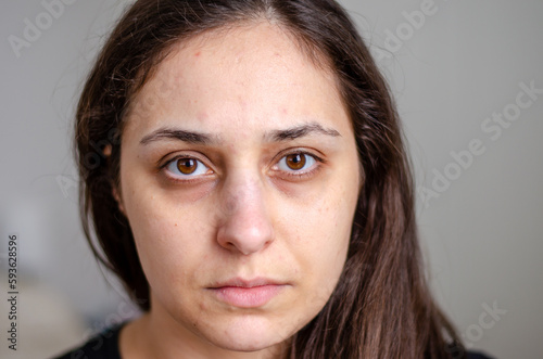 portrait of white brazilian woman with no make up looking at camera