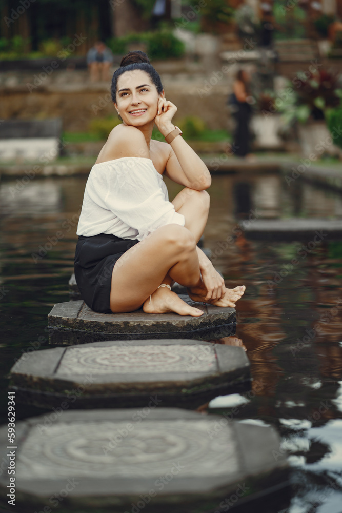 girl exploring a beautiful park in Bali girl exploring a beautiful park in Bali
