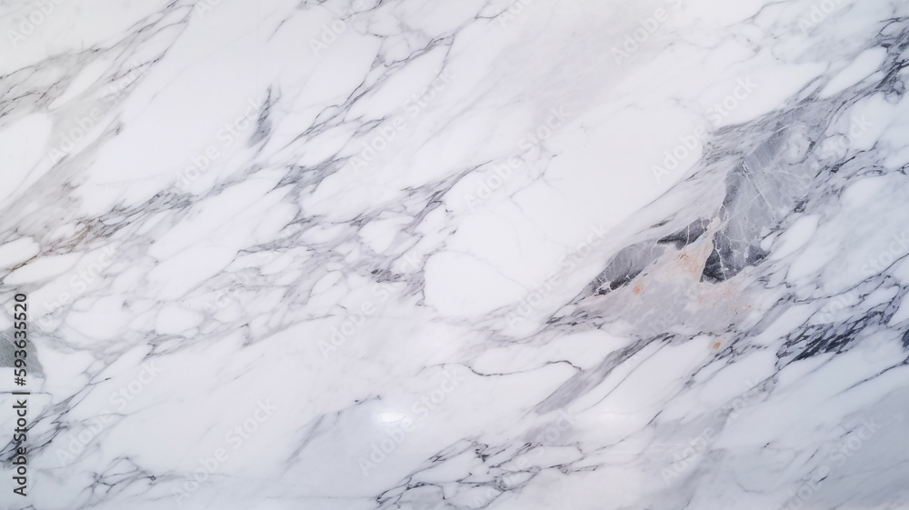 A white marbled marble surface with a brown and white color.