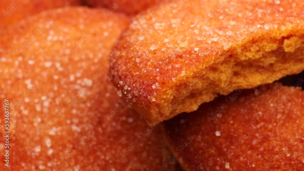 orange cookies, rotation in circle. cookies with sugar Turning. selective focus orange cookies, rotation in circle. cookies with sugar Turning. selective focus