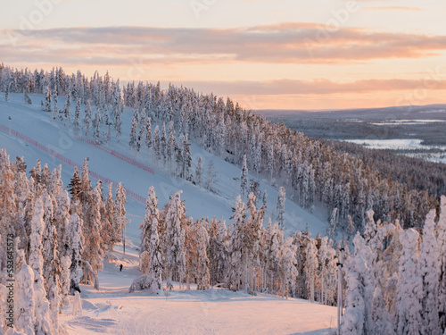 Winter sunrise view of ski slopes and mountains in Levi, Kittilä, Lapland, Finland