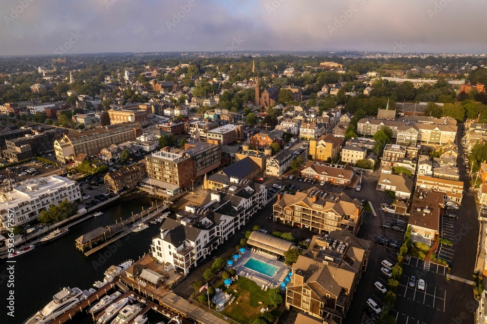 Drone view of Newport Harbor in Rhode Island with gray stormy sky in background Drone view of Newport Harbor in Rhode Island with gray stormy sky in background