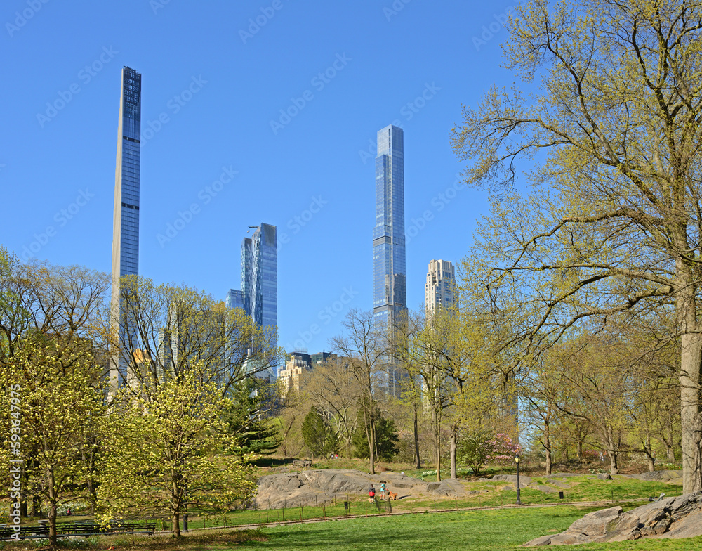View of skyscrapers from Central Park in New York City on spring bright day View of skyscrapers from Central Park in New York City on spring bright day