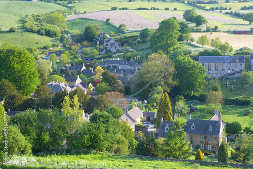 View over Cotswold village of Naunton, Cotswolds, Gloucestershire, England, United Kingdom photo