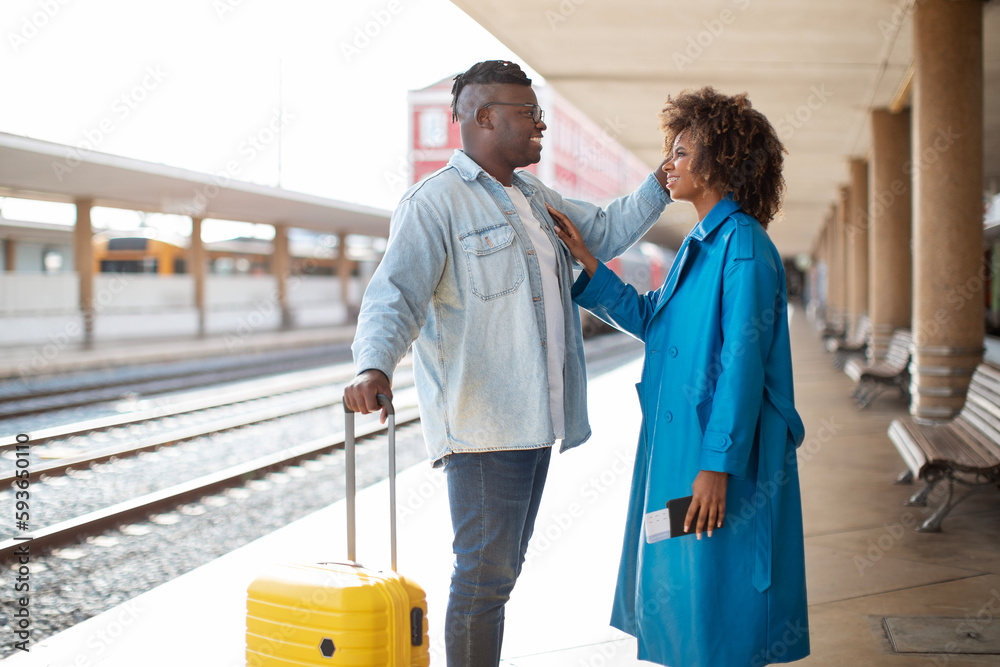 Honeymoon Trip. Happy Romantic Black Spouses Waiting Train At Railway Station