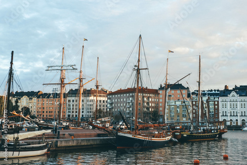 Wide look of huge wind boat side with ropes on finish seaport  © Radu